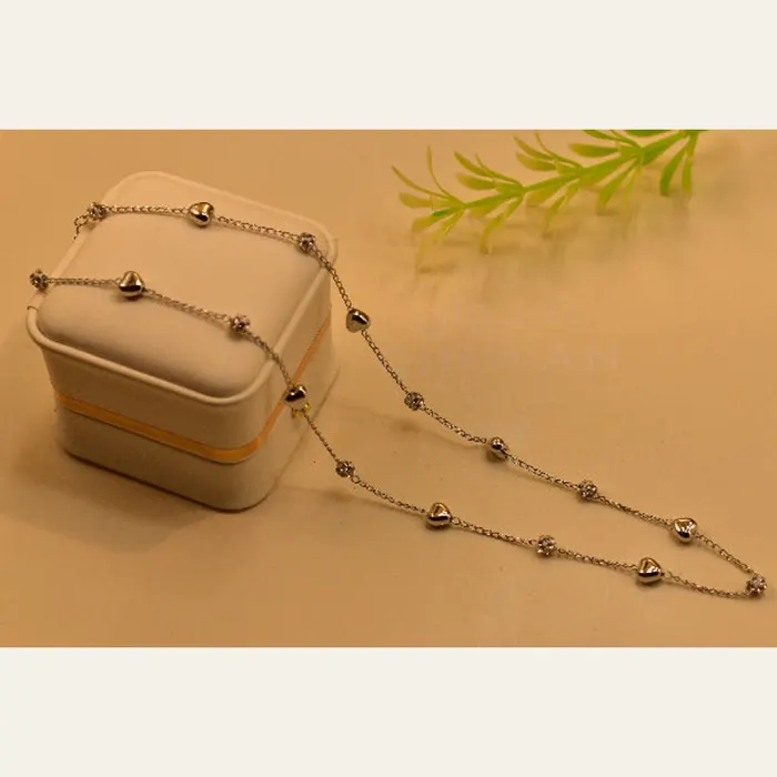 Luminous Unique Heart Design Crystal Stones Pendant in Silver